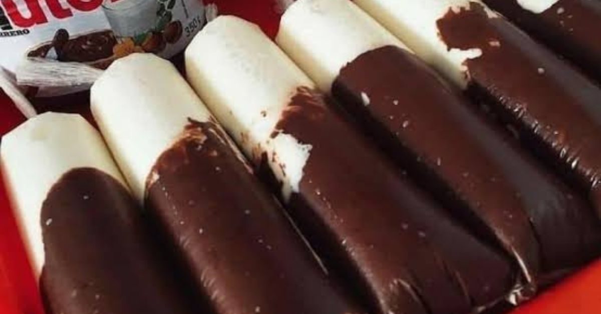 Geladinho gourmet cremoso de leite Ninho com Nutella, embalados em saquinhos plásticos.